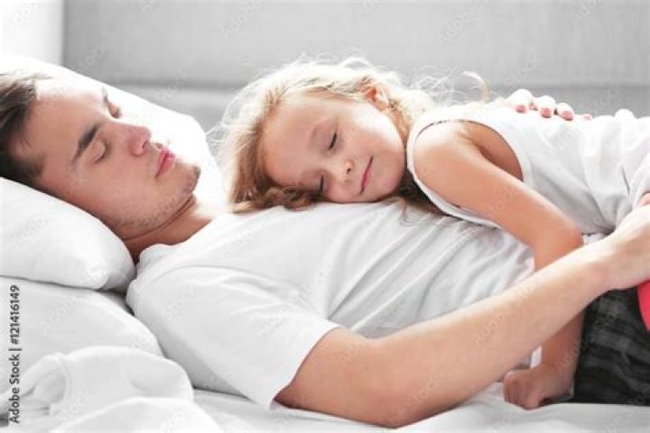 Does Carmela sleep with Father Phil?