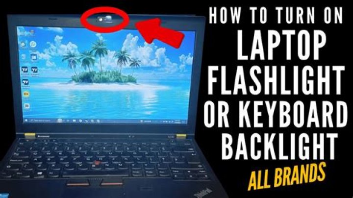 How do I turn on my flashlight on my laptop?