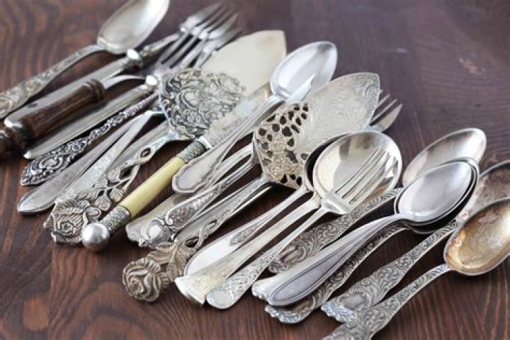 How is sterling silver flatware marked?