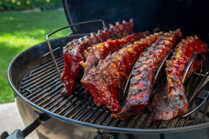 How long does it take to grill ribs on a charcoal grill?