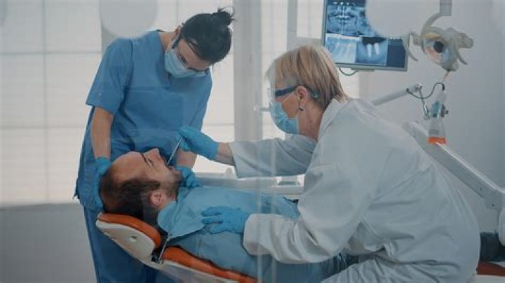How many dental offices does dental Corp own?
