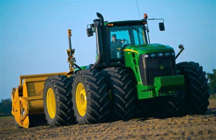 How much horsepower does a 8100 John Deere have?