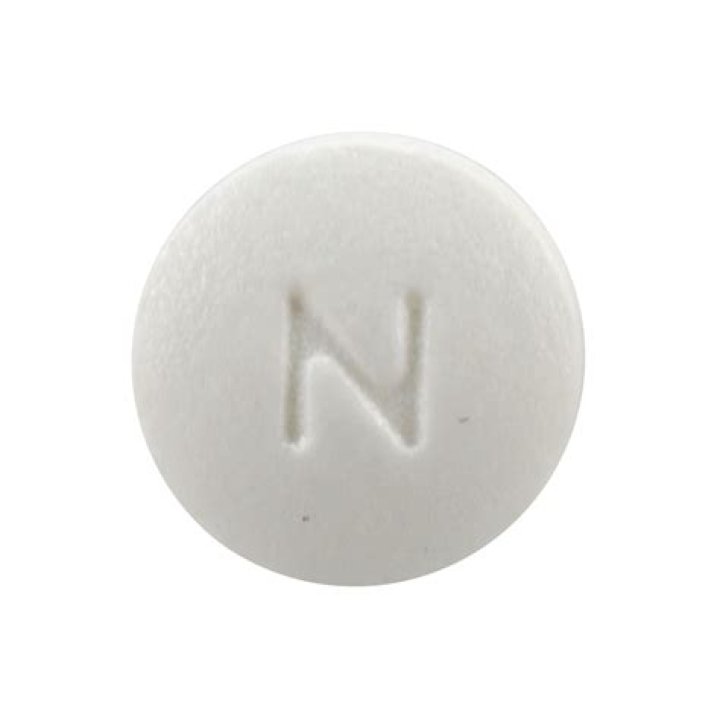 What is a white pill with Rp 15 on it?