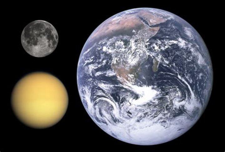 What is the relative mass of Saturn compared to Earth?