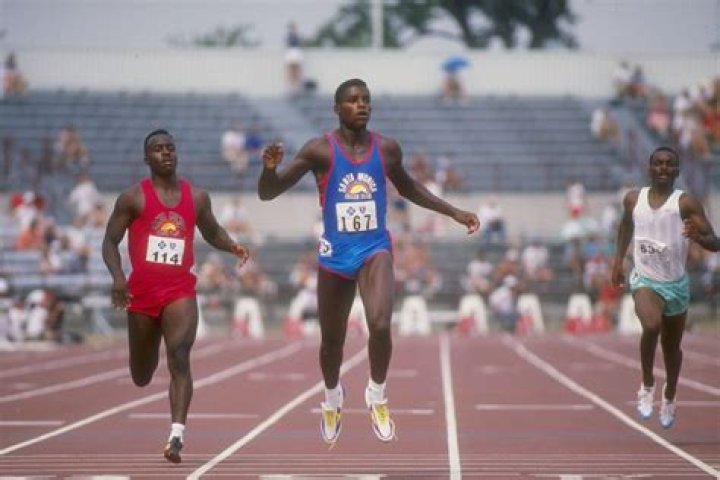 What was Carl Lewis fastest 100m?