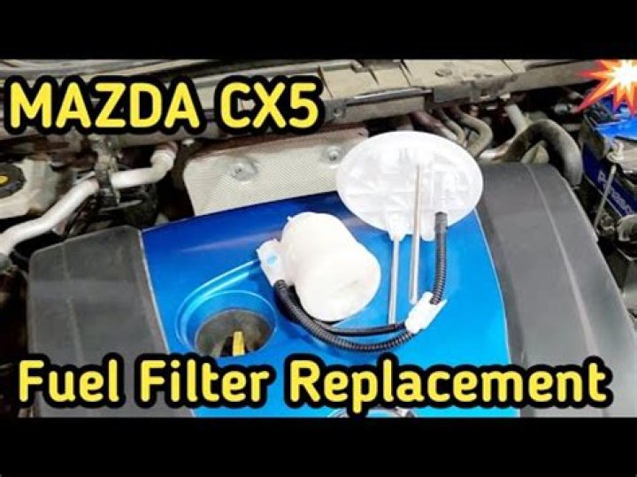 Where is the fuel filter on a Mazda?