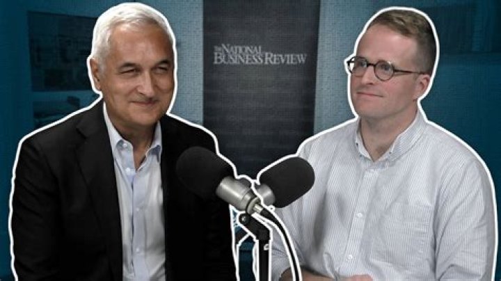 Who is the editor of American Songwriter?