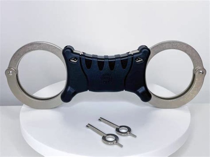 Why do British police use rigid handcuffs?