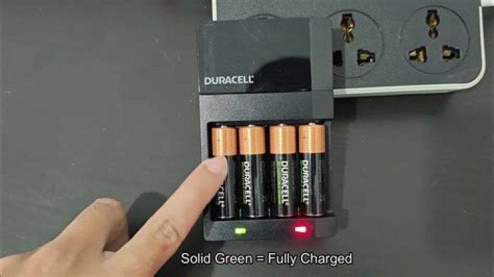 Why is my battery charger blinking green?