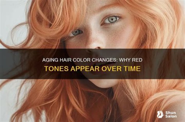 Why is my hair turning red as I age?